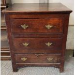 A 19th century oak chest of drawers, with three lo