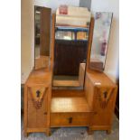 A 1950's oak dressing table, with a three section