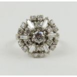 A diamond bombe cluster ring, the central round br