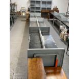 Long run of industrial metal adjustable shelving