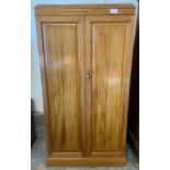 A 20th century hardwood two door wardrobe, 178cm h