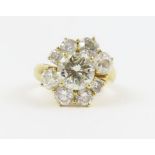 An unusual diamond cluster ring, the centre diamon