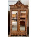 A 19th century two door mirrored wardrobe, with a