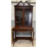 A 20th century mahogany Chippendale style glazed c