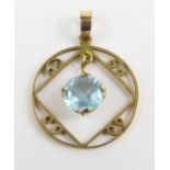 An early 20th century pendant, a single round blue