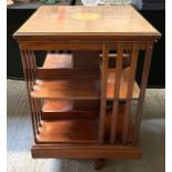 An Edwardian inlaid mahogany revolving bookcase, 7