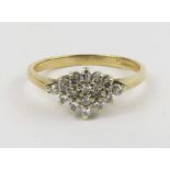 A 9ct gold diamond cluster ring, finger size L 1/2