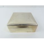 A plain silver square cigarette box, London, 1931,