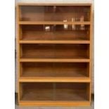 A mid century five section "simplex" bookcase, wit