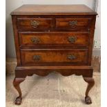 A 19th century walnut chest of drawers, of two sho