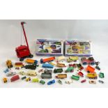 A collection of die cast toys including dinky, alo