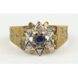 A 9ct gold sapphire and diamond cluster ring, fing