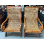 A pair of 20th century steamer type chairs, each w