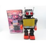 A Padgett Brothers Saturn TV battery operated robo