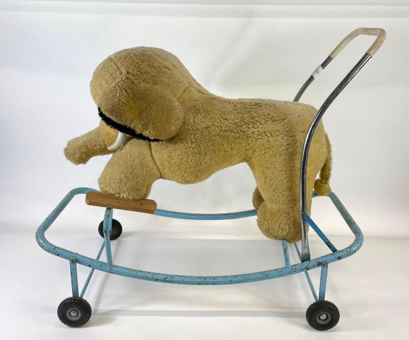 A Pedigree/Triang Plush push-along/rocking elephan