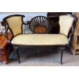 A late Victorian parlour two seater settee with li
