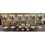 A set of six silver metal tall stem goblets with h