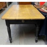 A Victorian painted pine kitchen table on turned s