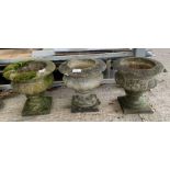 A set of three stone effect garden planters of lob