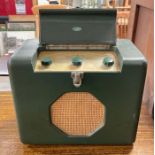 A Roberts electric/battery radio in green case, wi
