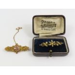 An early 20th century split pearl bar brooch in a