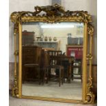 A 19th century overmantel mirror with gilt gesso f