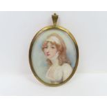 An oval miniature portrait on ivory of a young wom