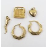 Three 9ct gold charms and a pair of hoop earrings