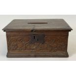 A 19th century carved oak rectangular box, the hin