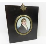 An oval miniature portrait on ivory of an 18th