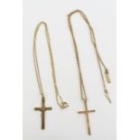 A 9ct gold crucifix and a cross marked '9ct', and
