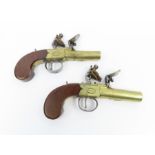 A pair of 19th century flintlock pocket pistols by