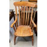 A slat back Windsor farmhouse chair with shaped se