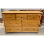 A light oak chest of short drawers, 78cm high 125c