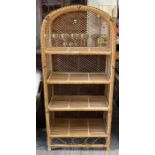 A woven cane arched free standing shelf unit, 149c