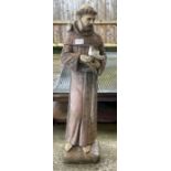 A garden statue of St Francis of Assisi 76cm high