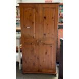 A pine wardrobe 160cm high 80cm wide 53cm deep