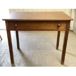 A walnut side table fitted with single frieze draw
