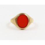 A 9ct gold signet ring set with an oval carnelian s