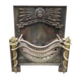 A decorative cast iron fireplace, the top section