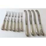 A collection of ten silver pistol end fork and kni