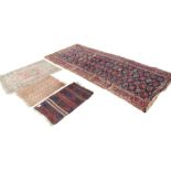 A collection of decorative rugs and carpets, vario