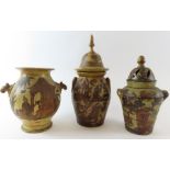 A terracotta decoupage two handled vase 25cm high,