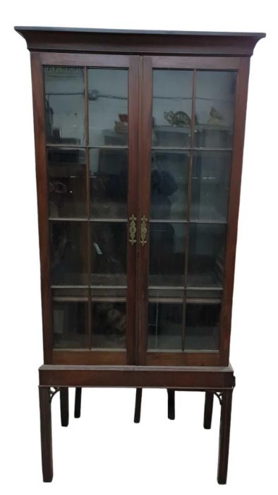 A 19th century mahogany bookcase having pair of as