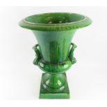 A large green glazed pottery campana shaped jardin