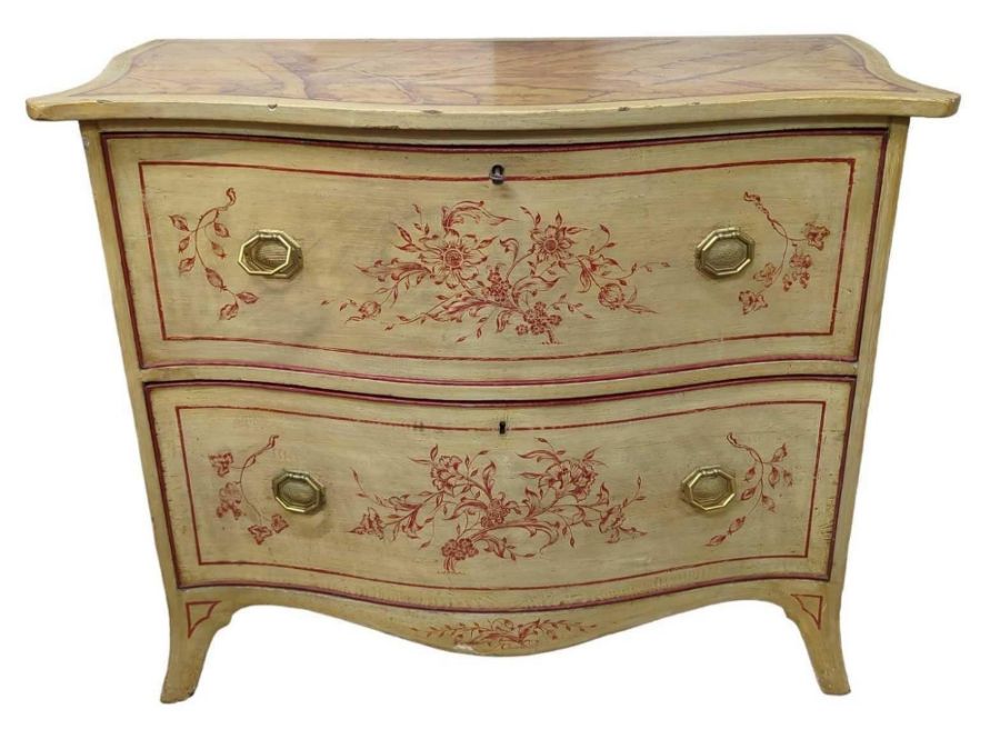 A serpentine chest of two long drawers now with pa