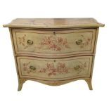 A serpentine chest of two long drawers now with pa