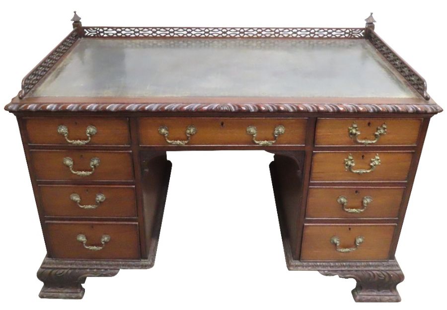 A Victorian mahogany kneehole desk, in the Chippen