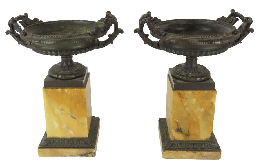 A pair of 19th century grand tour bronze and siena