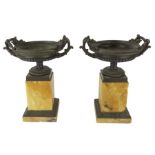 A pair of 19th century grand tour bronze and siena